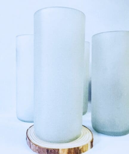 Four frosted clear tall glasses